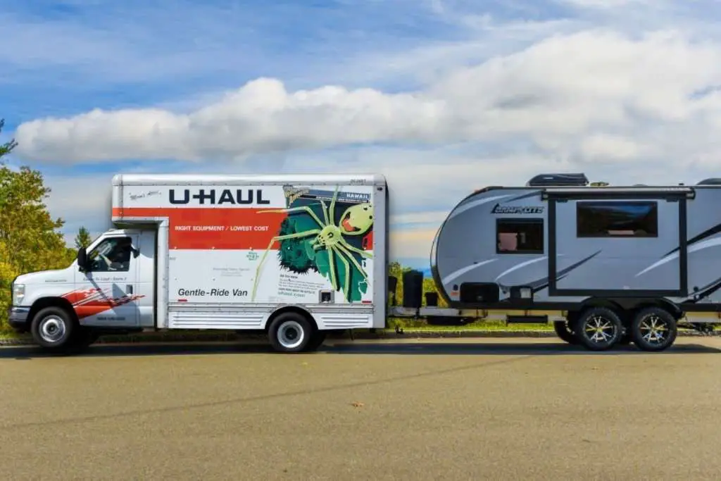 U-Haul trucks tow a camper