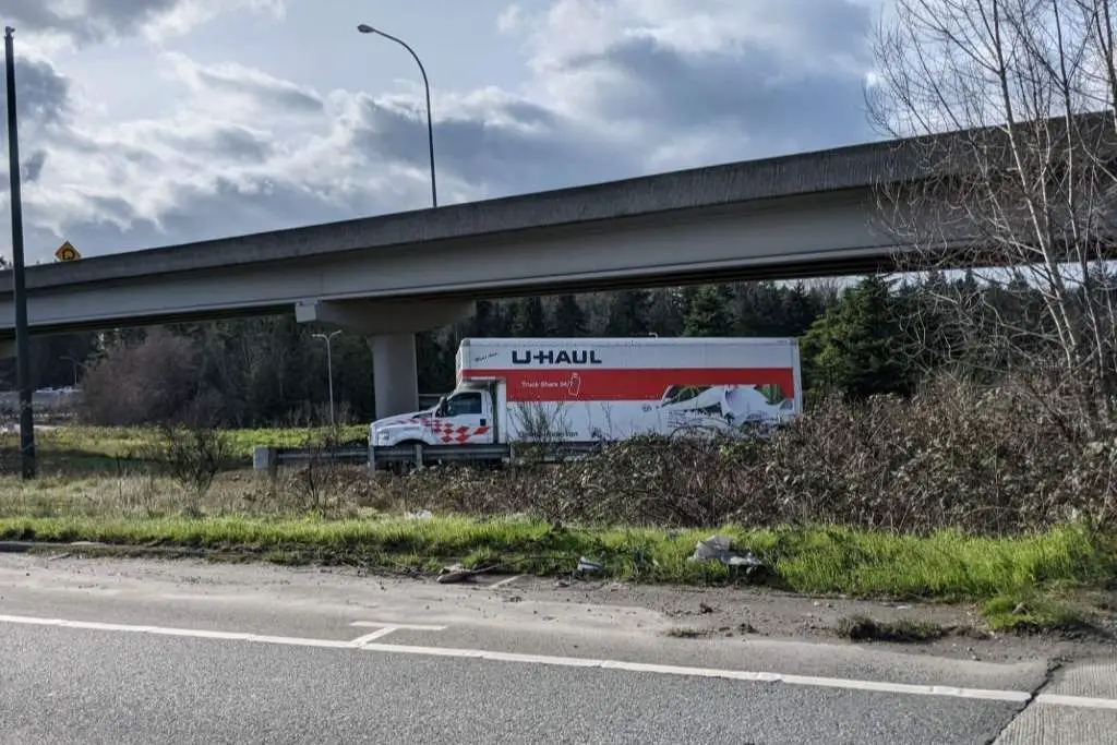 U-Haul moving truck on the freeway on a sunny day